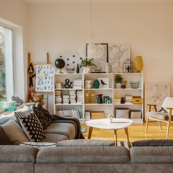 A bright family living room with bookshelves